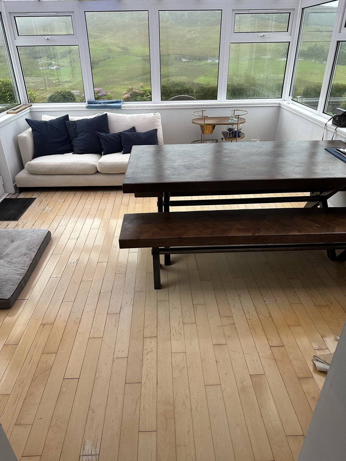 Conservatory dining area with views over the Fairy Glen at Gleann Síth House